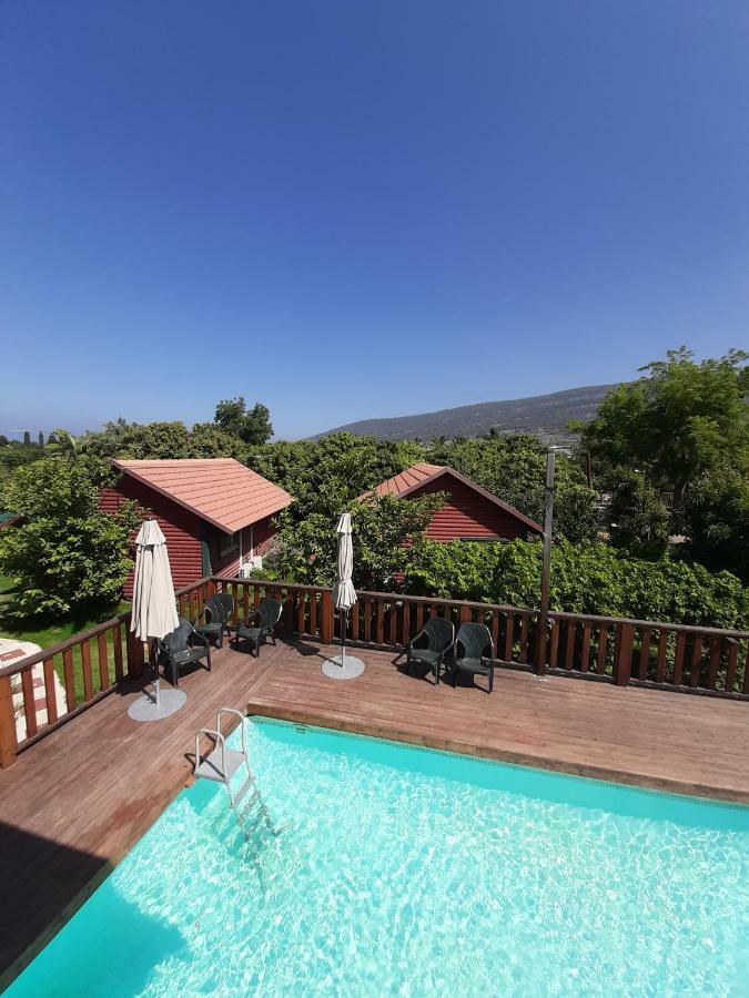 The Wooden Rose Cabins Bezet Bagian luar foto
